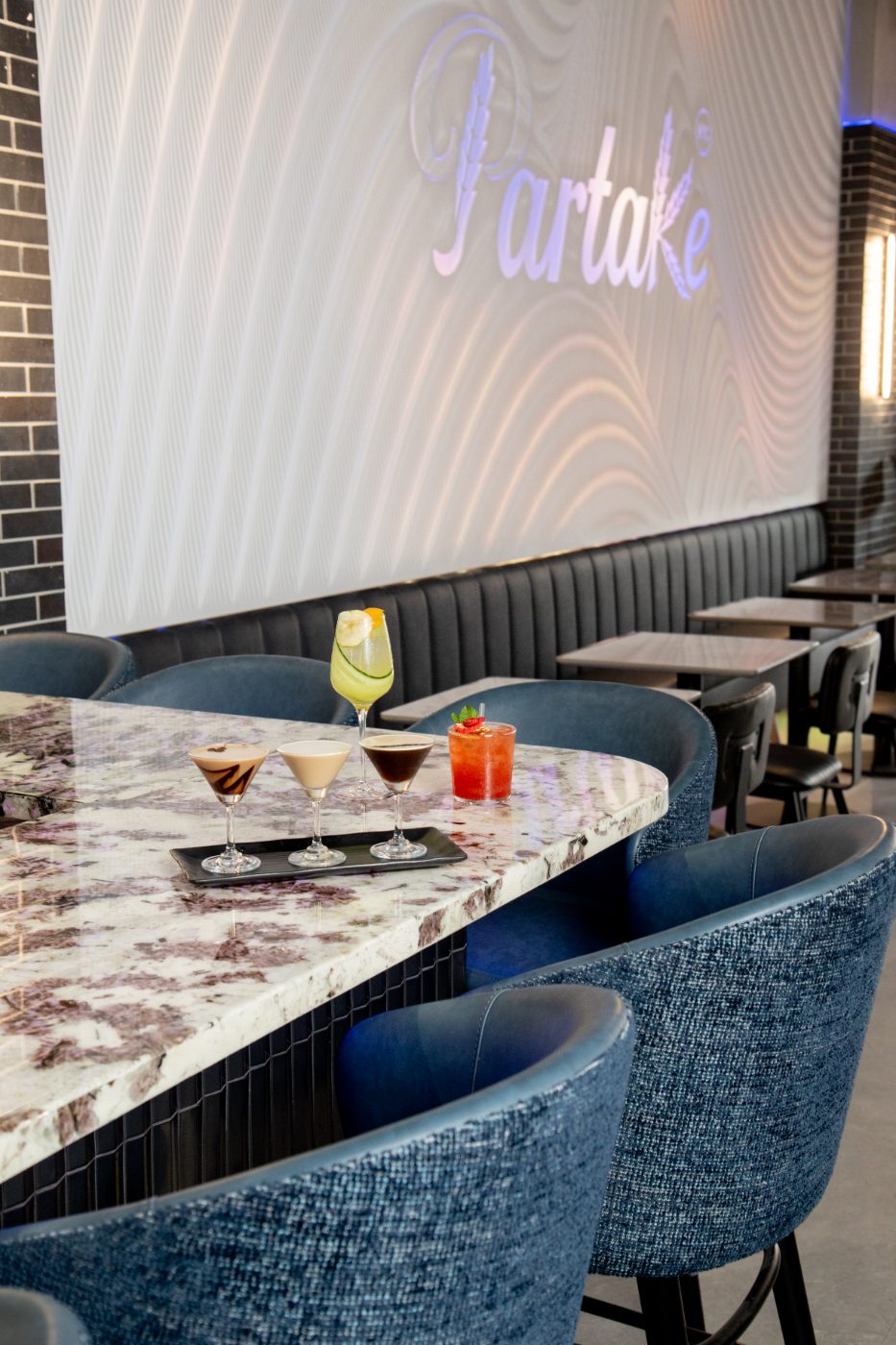 A marble table set with cocktails
