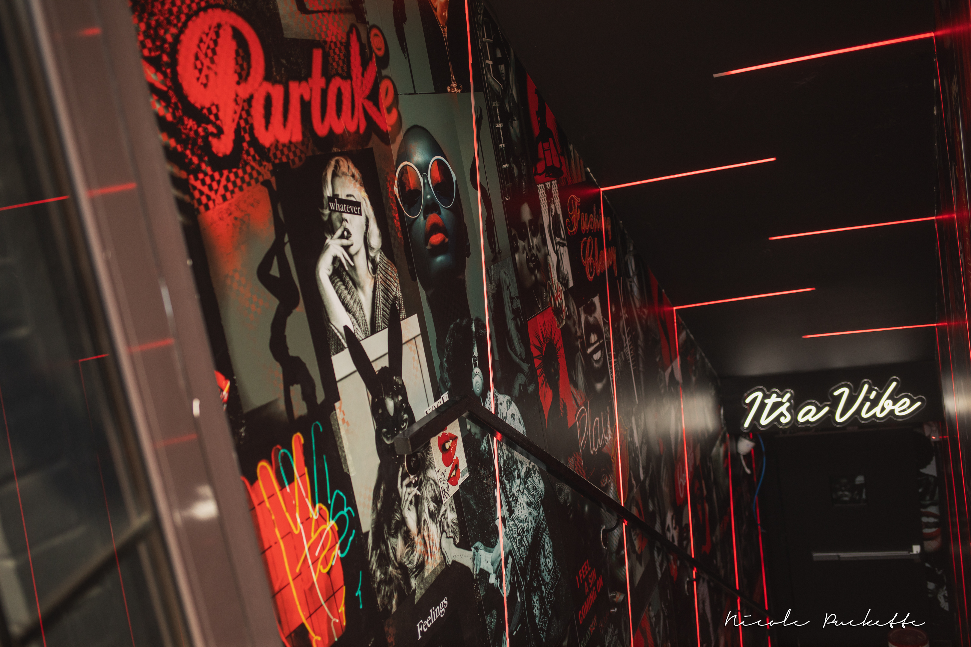The neon stairwell at Partake NYC